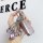 Elegant lincoln corsair key cover with sparkling pink crystal accents and a luxurious leather finish, perfect for stylish car...