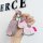 Elegant pink leather key cover for jaguar xfl, xel, and e-pace, featuring a decorative horse charm and sparkling details.