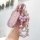 Elegant xiaomi su7 key cover with a glittery pink design, featuring a premium leather card holder and decorative beaded charm...