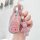 Elegant maserati key cover for women, featuring a pink glitter design with a teddy bear charm, perfect for stylish car owners...