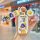 A hand holds a chery qq ice cream key cover for women, featuring a cute cartoon design with chinese text and a yellow flower ...