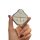 A hand holds a sleek, silver wuling bingo plus key cover with a textured design and dual button layout, showcasing its premiu...