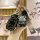A hand holds a sleek black key cover for the 2024 jetour x70 plus, featuring a stylish design with a cartoon bear charm and a...