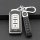 Elegant mitsubishi key cover for outlander, eclipse cross & pajero, featuring a sleek leather design and matching braided str...