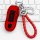 Red porsche key cover for macan, cayenne, panamera, and 718, featuring a braided leather keychain and sleek design, displayed...