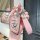 Elegant pink leather bmw key cover for 3 series, 5 series & x5, featuring a sleek design and matching wrist strap.