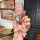 A hand holds a stylish pink key cover for hyundai models like the ix35, ix25, and elantra 7th gen, featuring a decorative bow...