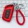 A vibrant red key cover for baojun vehicles, featuring a sleek design with a braided leather loop and a metallic clip, displa...