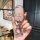 A hand holds a benteng xiaoma 2024 key cover featuring a cute horse design, with a sparkling pink finish and a decorative rin...
