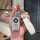 Elegant yamaha nmax155/xmax300 key cover with a sleek silver design, featuring a stylish h charm and a white leather strap la...