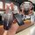 Hand holding a sleek benteng t99 key cover with soft-touch silicone shell, featuring a stylish design and front view of the k...
