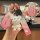 Stylish hyundai key cover in pink, featuring a cute bear charm and sleek design for elantra, tucson, sonata, and more.