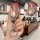 A hand holds a chery qq ice cream key cover, showcasing its sleek design and front view with a decorative keychain. the cover...
