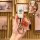 A hand holds a sleek, premium nissan x-trail key cover for the 2022 model, featuring a foldable design with two buttons and a...