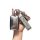 A hand holds a sleek jaguar key cover and matching leather fob, both featuring the iconic jaguar logo and jaguar text, design...
