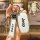 Jeep key cover for compass, cherokee, and grand cherokee featuring a sleek white design with jeep branding and a matching key...
