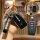 A hand holds a sleek black lexus key cover for es200, es300, nx200, rx, and ux models, showcasing its front design and style ...