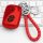 Red lexus key cover for ct200h, gx400, rx270, rx350, featuring a braided red lanyard and sleek design, displayed on a keyboar...