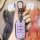 A hand holds a stylish purple rongwei rx5 key cover, featuring a sleek design with three buttons and a porsche emblem keychai...
