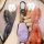 A hand holds a sleek, lavender leapmotor t03 onyx edition key cover with a metallic carabiner, set against a backdrop of colo...