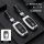 Premium leather kia sportage key cover in silver and deep space black, featuring a wrist strap and sleek design for k3/k4/k5/...