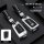 Model b skoda key cover in silver and deep space black, featuring a leather protector with wristband style, suitable for vw s...
