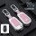 Peugeot key cover in silver and cherry blossom pink, featuring a metal buckle style, designed for 308, 408, 3008, and 508 mod...