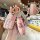 Elegant 10th-gen civic key cover featuring a pink leather design with a teddy bear motif and rhinestone accents, offering bot...