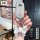 Elegant perodua toyota key cover with a glittery finish and butterfly keychain, offering stylish protection for your car remo...