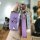 A hand holds a purple honda odyssey cr-v key cover tpu protector, featuring a sleek design with three buttons and a decorativ...