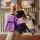 A hand holds a vibrant purple honda key cover with a matching bear-shaped keychain, designed for models like xrv, cr-v, civic...