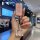 A hand holds a pink, glittery key cover for mitsubishi outlander, asx, and eclipse cross models, featuring a decorative ring ...