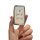 A hand holds a jaguar xfl key cover, showcasing its sleek design with a textured surface and four functional buttons for vehi...