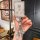 A hand holds a hongqi hs7 hs5 key cover (2023-2024 model) adorned with sparkling crystals and elegant charms, featuring the ...