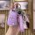 A hand holds a purple tpu key cover for opel astra insignia, featuring a sleek design with a good luck strap and a car logo c...