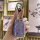 A hand holds a sleek, purple chevrolet suburban key cover with a metallic finish, designed for gmc yukon, featuring a secure ...