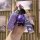 A hand holds a purple icar 03 key cover with a sleek design, accompanied by a cute bear charm and a stylish strap featuring f...
