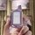 A hand holds a sleek, purple starline key cover designed for b6/b9/a91/a96 remotes, featuring a modern design with a clear di...