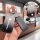 Hand holding a sleek black citroën key cover with a sparkling charm, designed for c5 aircross, c5 x, c6, and c3 xr models, sh...