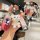 A hand holds a tengshi d9 key cover with a glossy pink finish and a cute bear charm, showcasing its front view in a modern in...