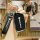 Black baojun key cover for rc5/kiwi ev/rc6/rs3/rs5/e300, featuring a sleek front design with logo and leather strap.
