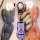 A hand holds a purple nissan classic sylphy key cover, showcasing its sleek design with buttons for lock, unlock, and horn, s...