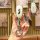 A hand holds a sleek, white ideal one key cover 2021 with a silver keychain, showcasing its front view and premium leather de...