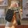 A hand holds a chery eq1 tiger e key cover, showcasing its sleek black leather design with a decorative keychain featuring a ...
