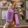 A hand holds a purple mitsubishi key cover for outlander 2021, eclipse cross & asx, featuring a sleek design with a matching ...