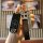 A hand holds a sleek mazda 3 key cover with a slim leather shell, featuring a decorative keychain and a personalized number p...