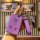 A hand holds a purple hongqi hs5 card key cover with a sleek design, featuring the logo and a matching strap, set against ...