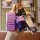 A hand holds a stylish purple jeep key cover for grand cherokee & renegade, featuring a gradient bear charm and a fashion str...