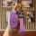 A hand holds a purple jeep key cover for grand cherokee & renegade, featuring a sleek design with a quilted strap and a decor...