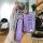 A hand holds a stylish purple key cover for geely gx7 models, featuring a diamond-patterned strap and a decorative h charm wi...